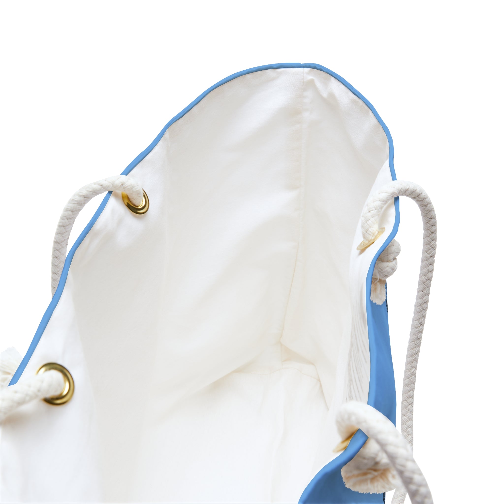 A close up of the crisp white interior of the moontiq 'I Got Wings' large angelic blue tote bag with white rope handles on a white background