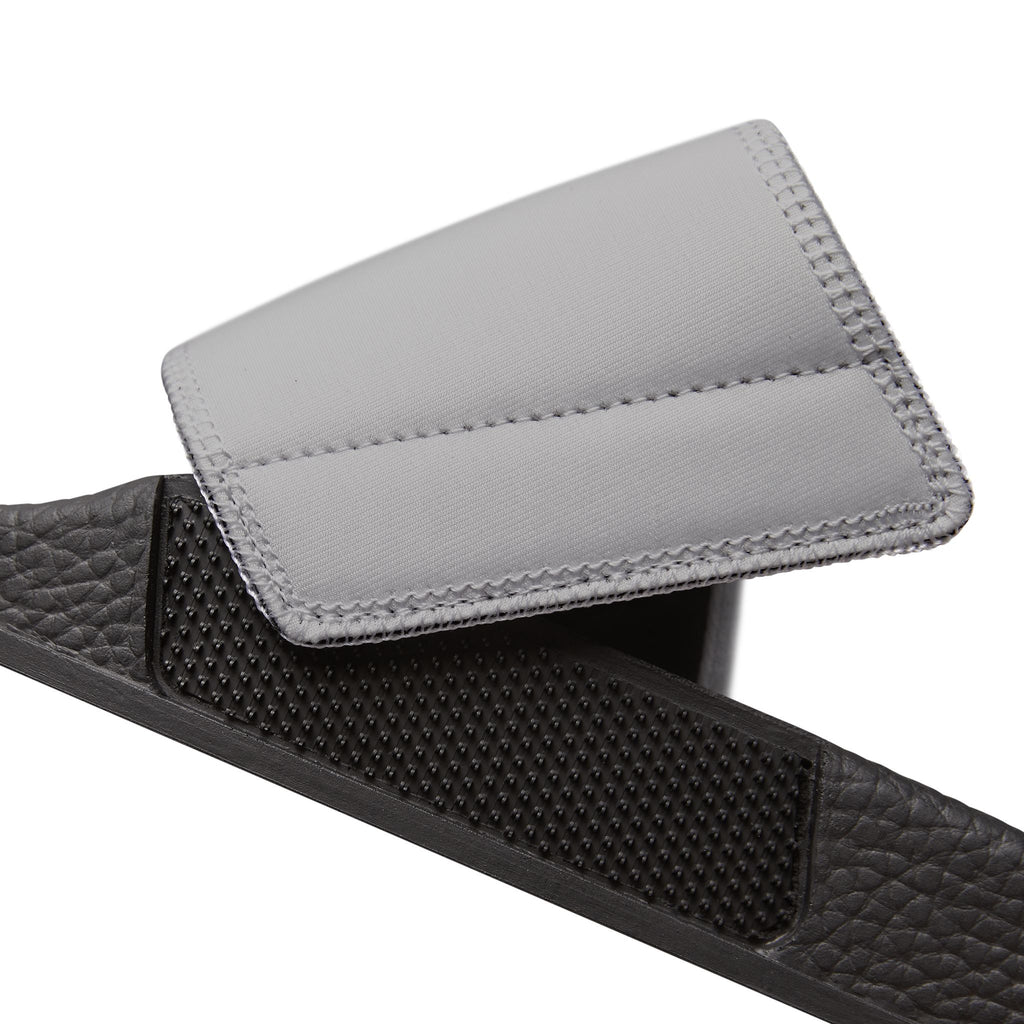 Removable and washable moontiq 'I Got Wings' men's comfortable slip on slides with black soles and gray straps featuring angel wing designs against a white background