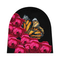 moontiq black baby beanie with pink roses and a butterfly on a black background