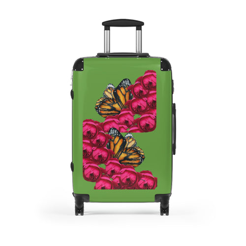 Beautiful moontiq green hard shell small carry on luggage with pink roses and orange butterflies on a white background