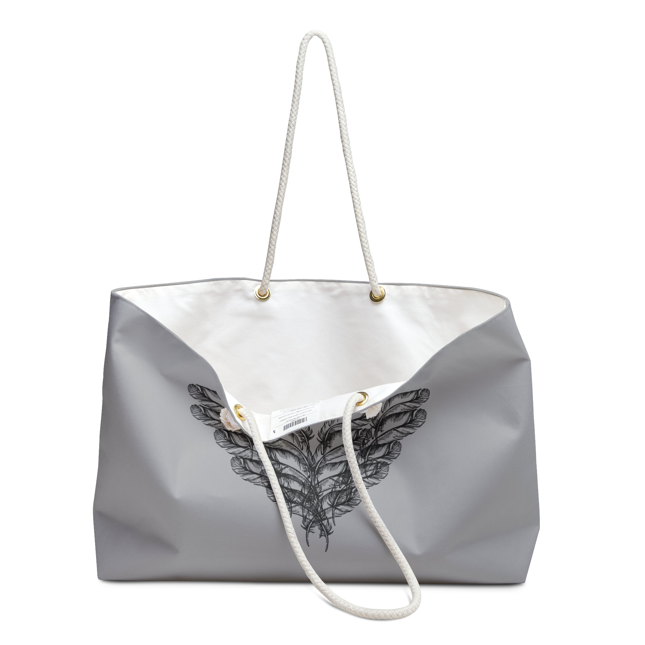 Close up view of clean white interior of the moontiq 'I Got Wings' heavenly gray tote bag with an angel wing design and white rope handles on a white background