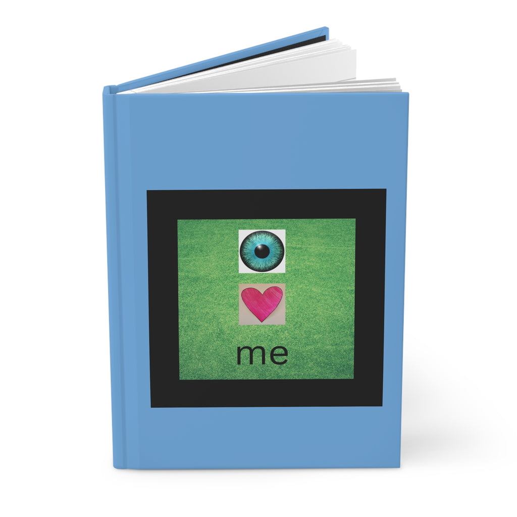 moontiq Blue 'I LOVE ME' notebook with a design on the front cover featuring an eye, love heart and the word 'me' against a white background.