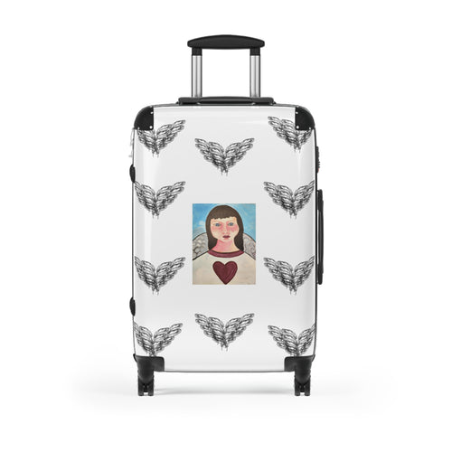 White moontiq small carry on 'my angel' suitcase with the moontiq artwork of an angel at the centre of the suitcase surrounded by angel wing graphics