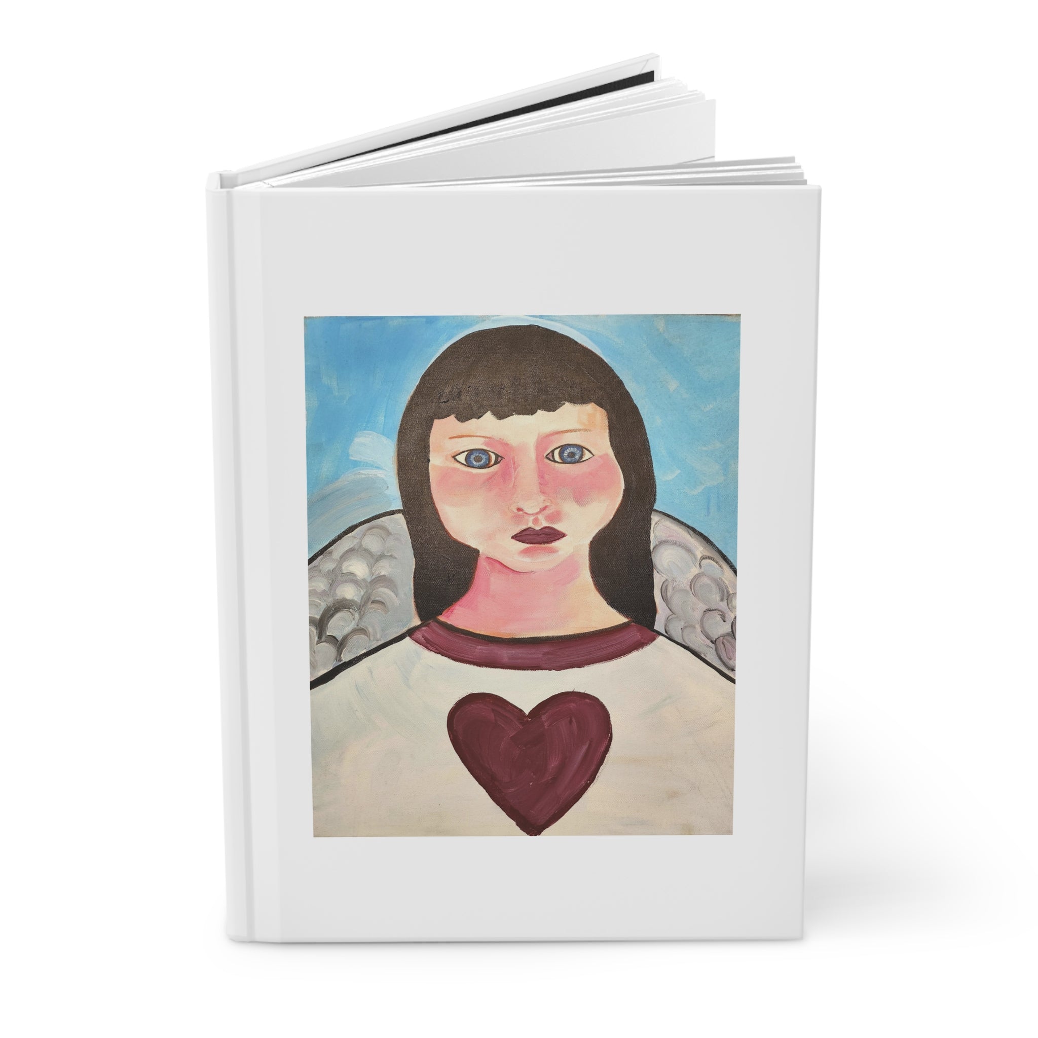 The moontiq 'My Angel' notebook with a moontiq painting of an angel on the cover with a heart on her chest.