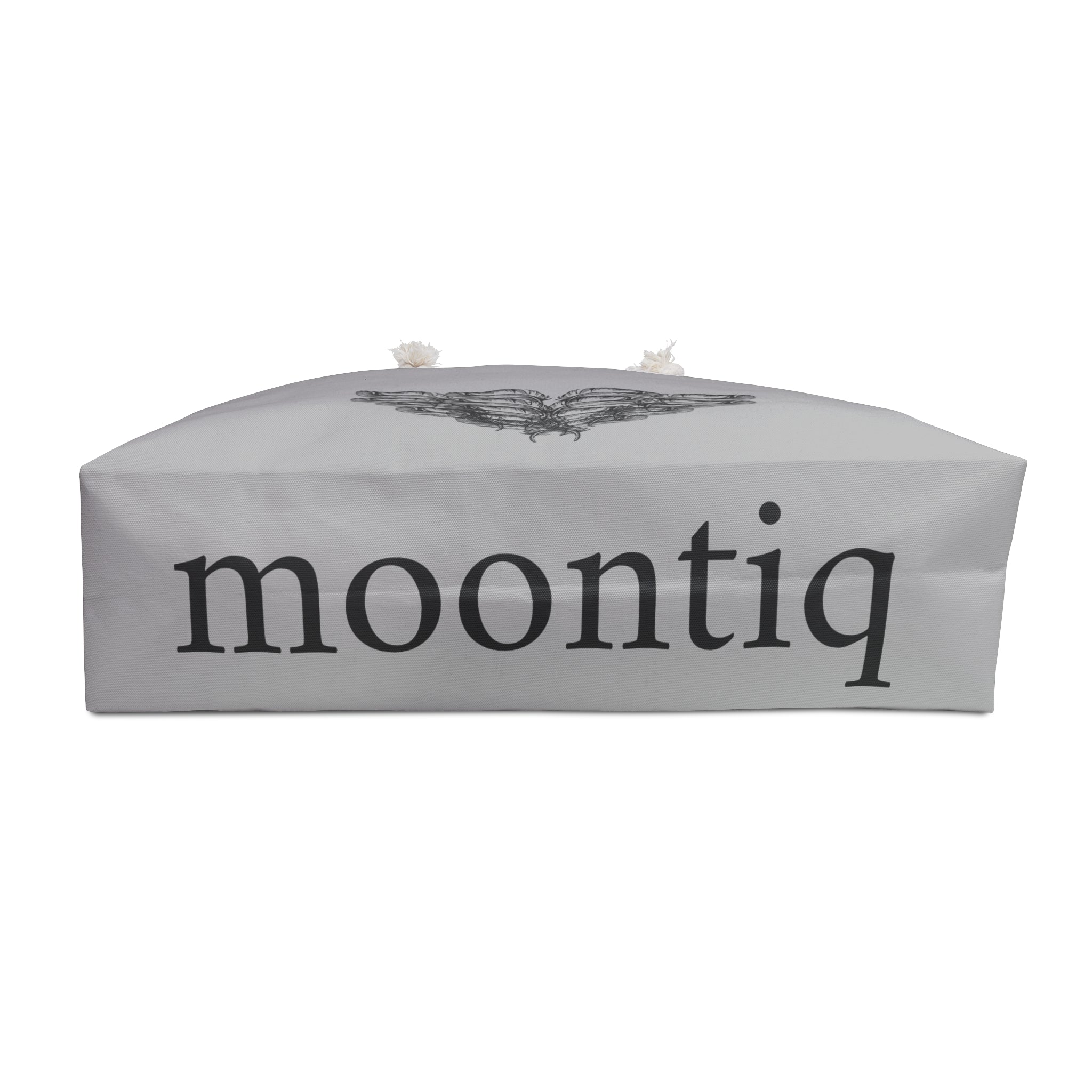 moontiq branding on the bottom of the 'I Got Wings' large heavenly gray tote bag with an angel wing design with white rope handles on a white background