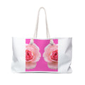 moontiq 'rose and sorbet' white tote bag with pink rose design and white rope handles against a white background